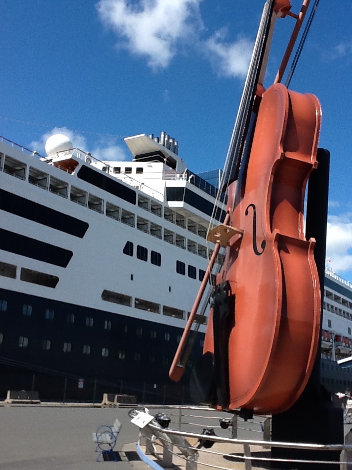 Cruise port giant fiddle at dock
