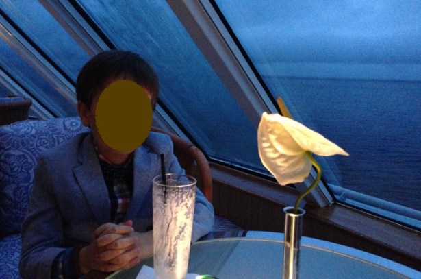 Son with mocktail in shipboard bar - 1