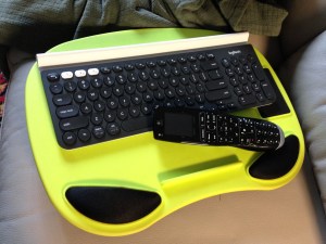 Bluetooth keyboard K780 Logitech on couch - 1