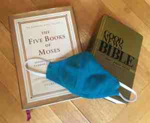 Jewish Torah, Good News Bible, and cloth face mask