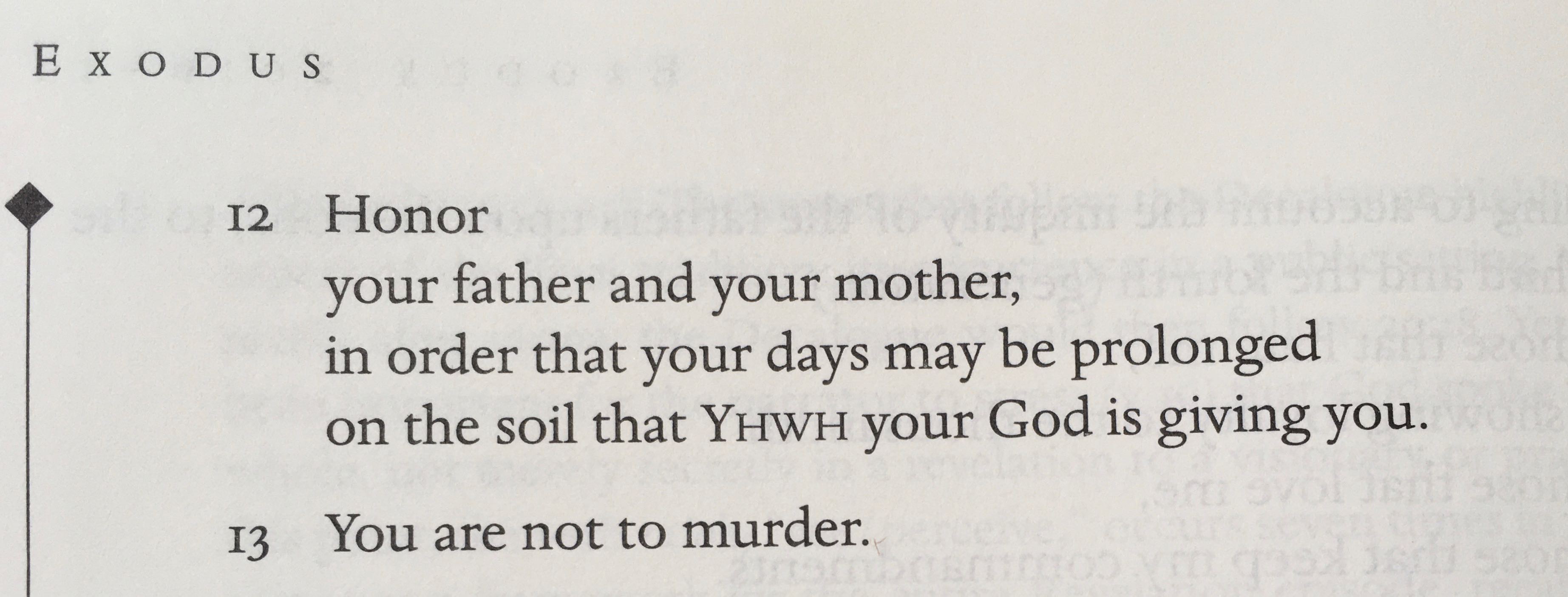 Excerpt of page of Torah/Bible showing Exodus 20:12-13