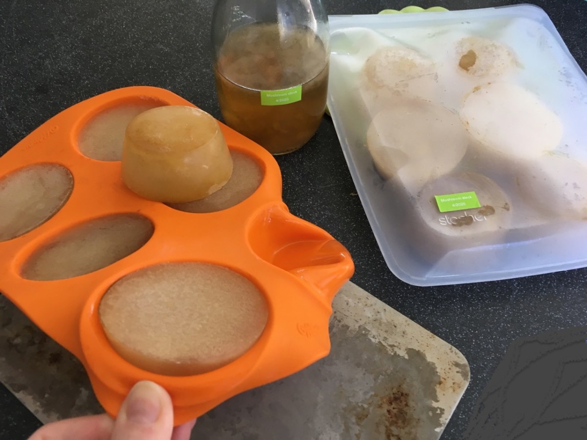 Mushroom broth frozen in silicone muffin tray and stored in baggie