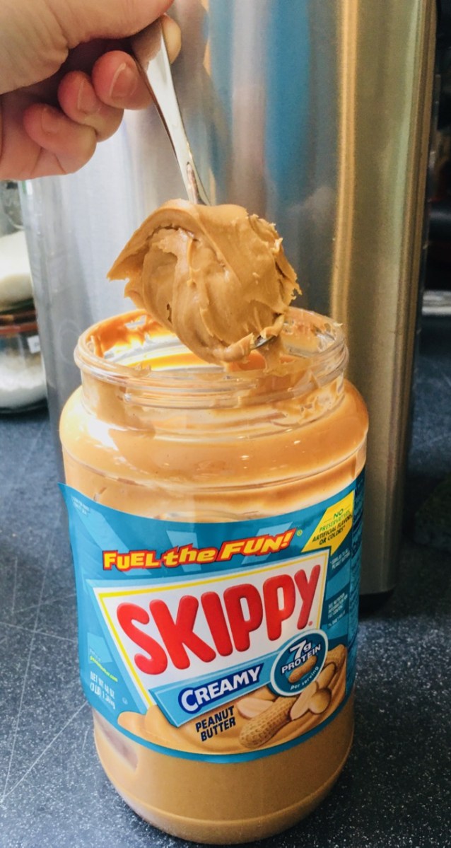heaping spoonful of creamy Skippy peanut butter