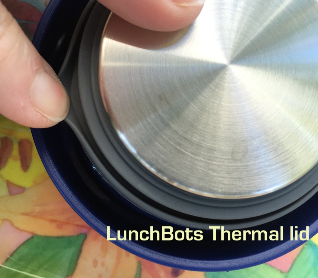 Blue plastic LunchBots lid with interior lined with stainless steel and grey silicone gasket