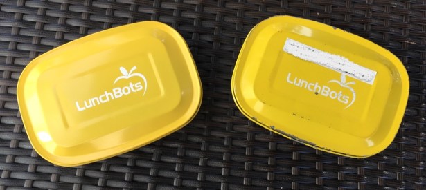 Replacement LunchBots Pico lid next to well worn 10 year old version