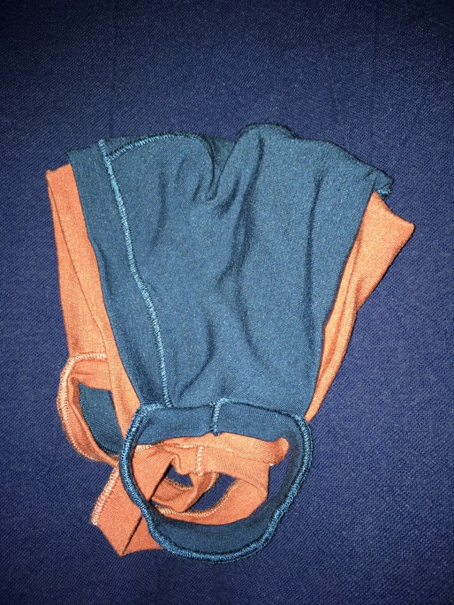 smaller blue mask layered over larger orange mask