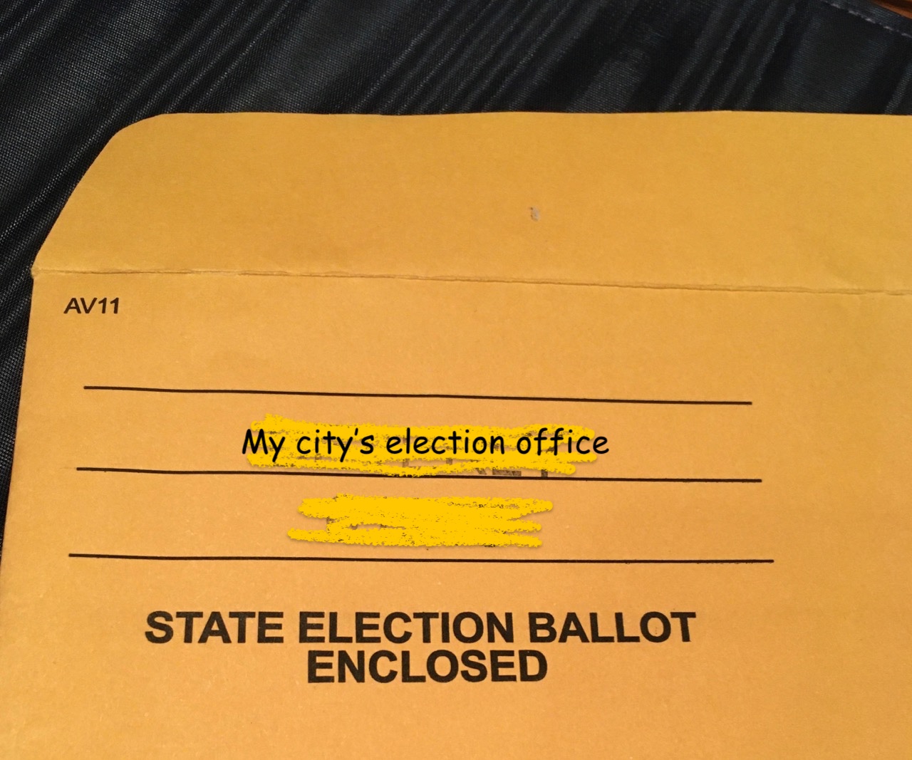 Mail in ballot envelope labeled State Election Ballot Enclosed
