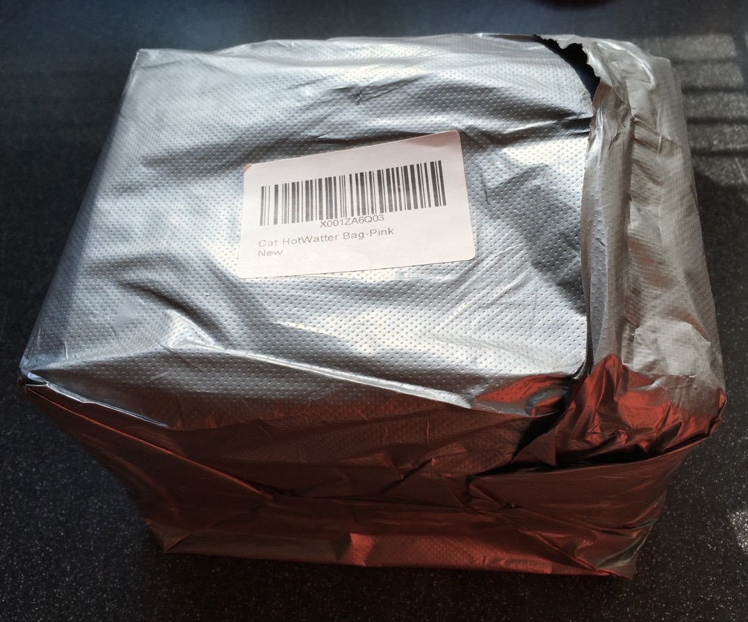 cat hot water bottle wrapped package