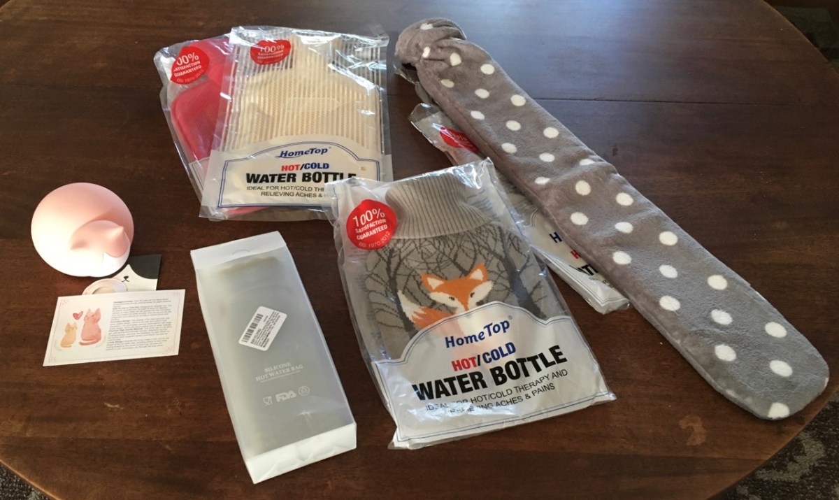 6 new hot water bottles with their packaging