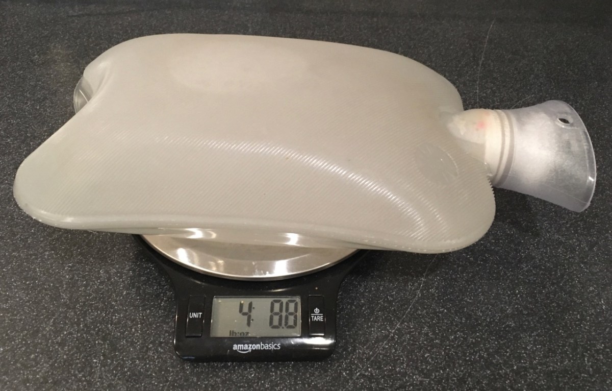 standard hot water bottle on scale showing 4 lb 8.8 oz