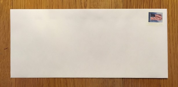 Number 10 (business size) envelope with stamp