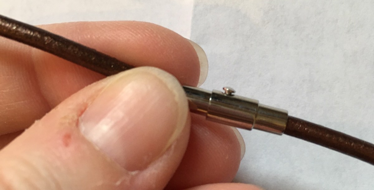 Close up of Bracelet Street magnetic necklace clasp closed with nubbin slid into slot