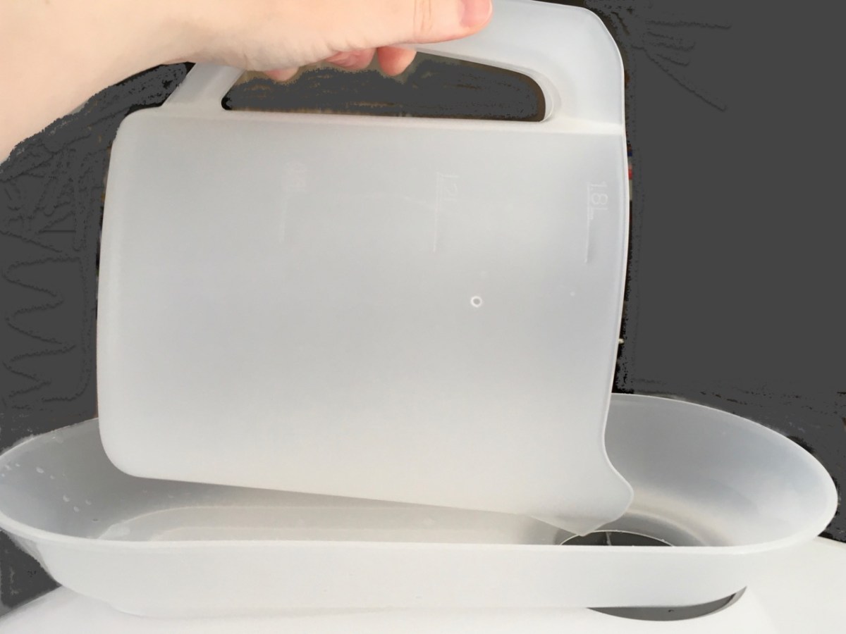 Filling water tank with pitcher