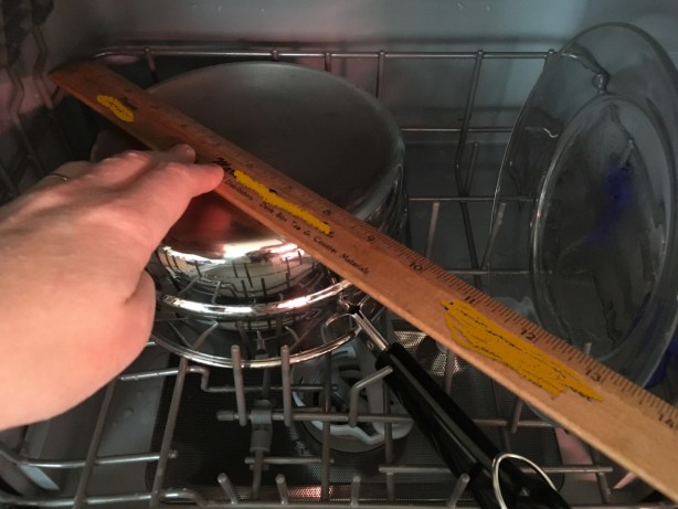 Revereware 2 quart saucepan and ruler showing about 15 inches max diagonal space inside appliance