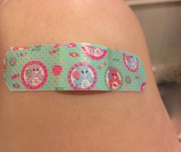 bandage on upper arm