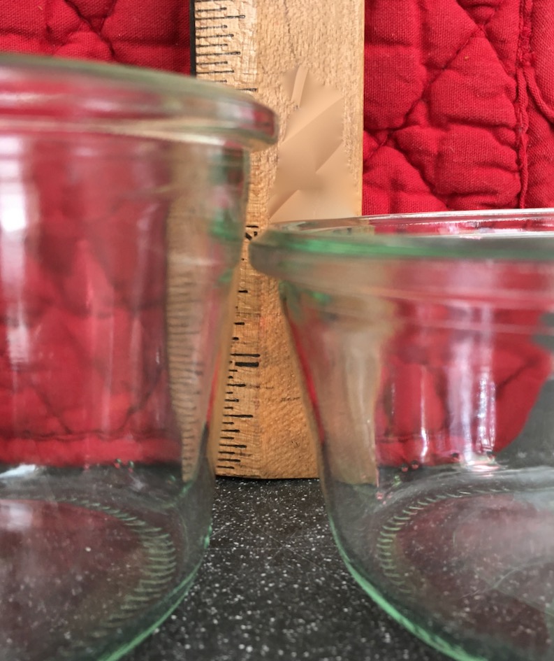 Ruler showing ~.75 inch height difference between two sizes