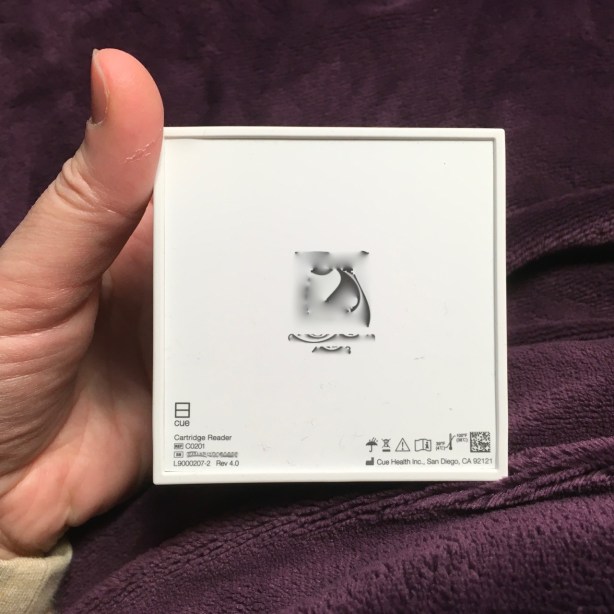 Bottom of Cue Reader with my QR code and serial number blurred out