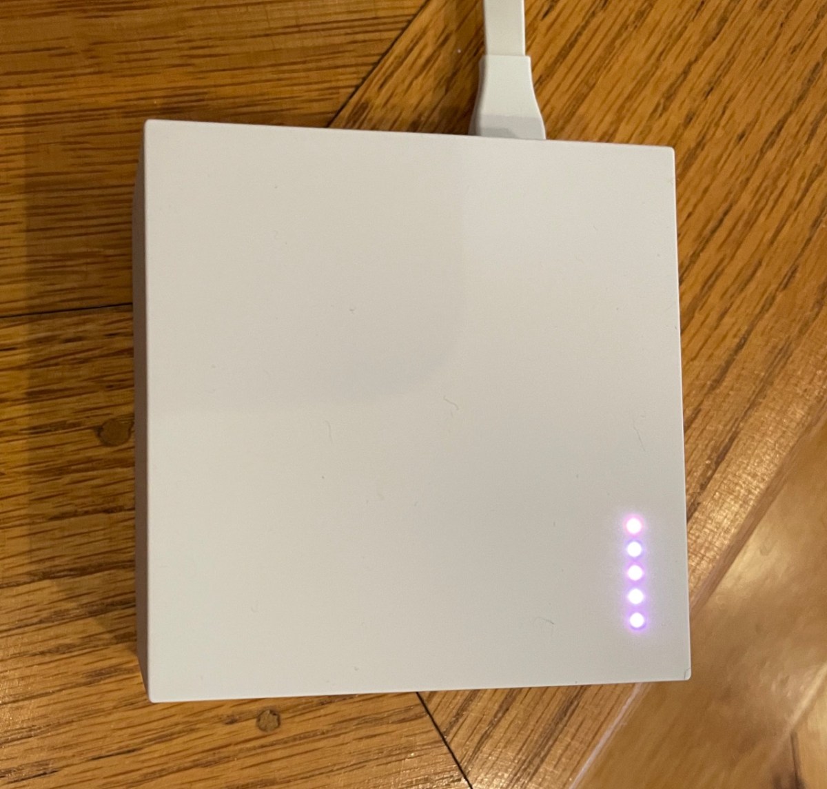 Top of Cue Reader with lights lit up