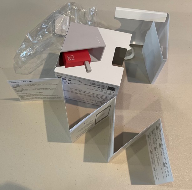 Jumbled pile of Cue Reader packaginge