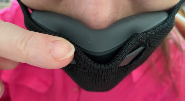 Cloth overlay an inch away from nose whereas silicone gasket on face piece is firmly next to skin