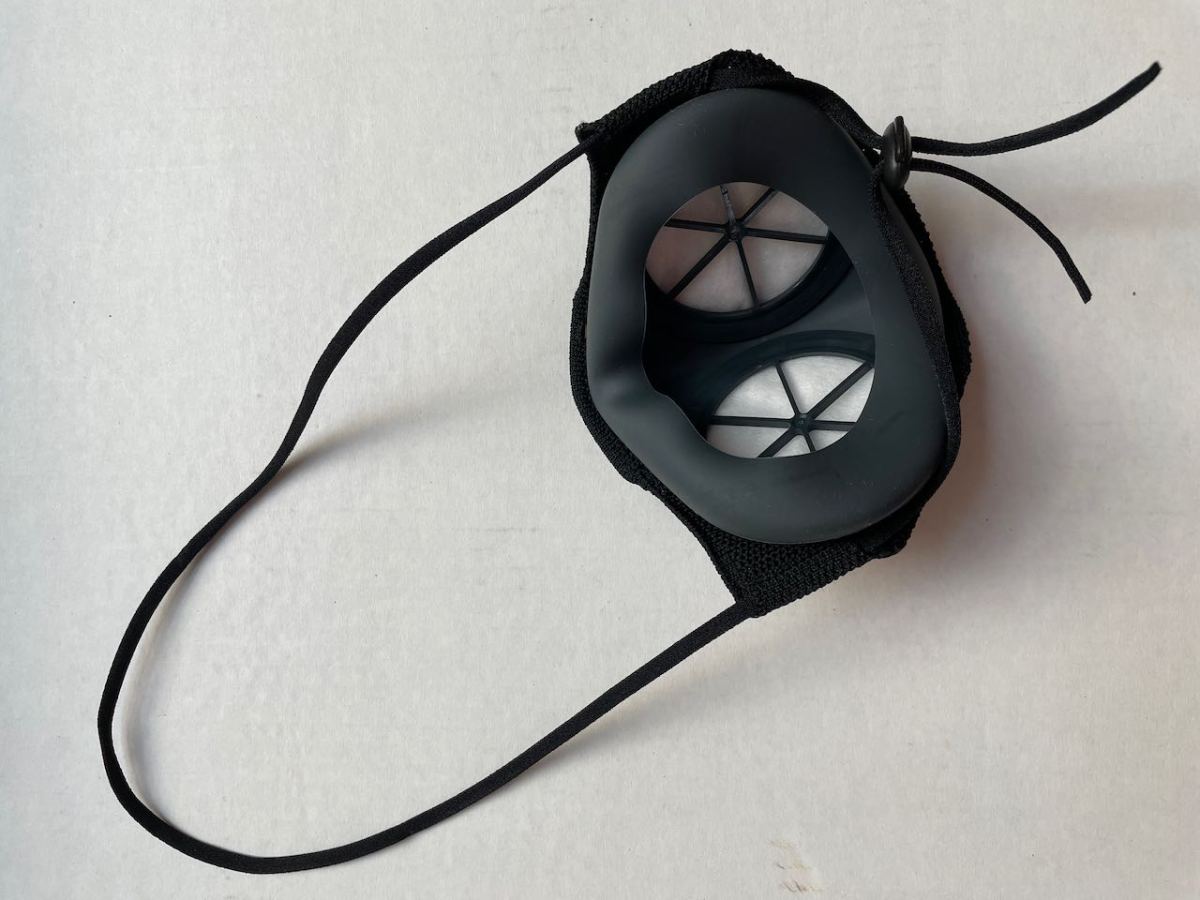 B2 Mask with loop of strap pulled all the way toward nose wire side