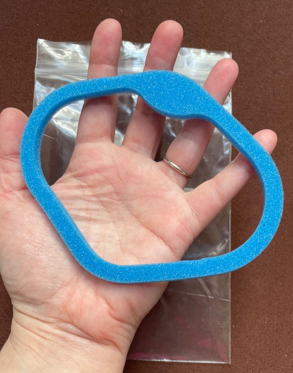 Blue foam Mask Liner is larger than the palm of my hand but not noticeable inside B2 Mask