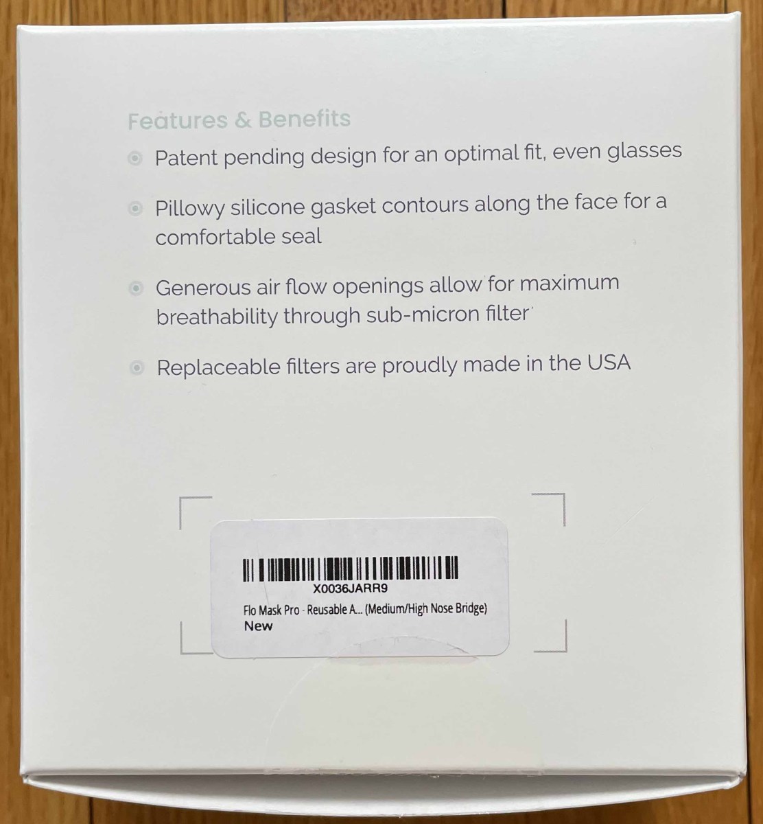 Bottom of FLO outer carton, features & benefits listed included filters made in the USA