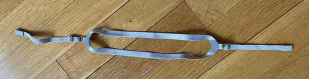 Optional Halo top strap has a loop with two sections of grippy silicone between the straight ends of the strap