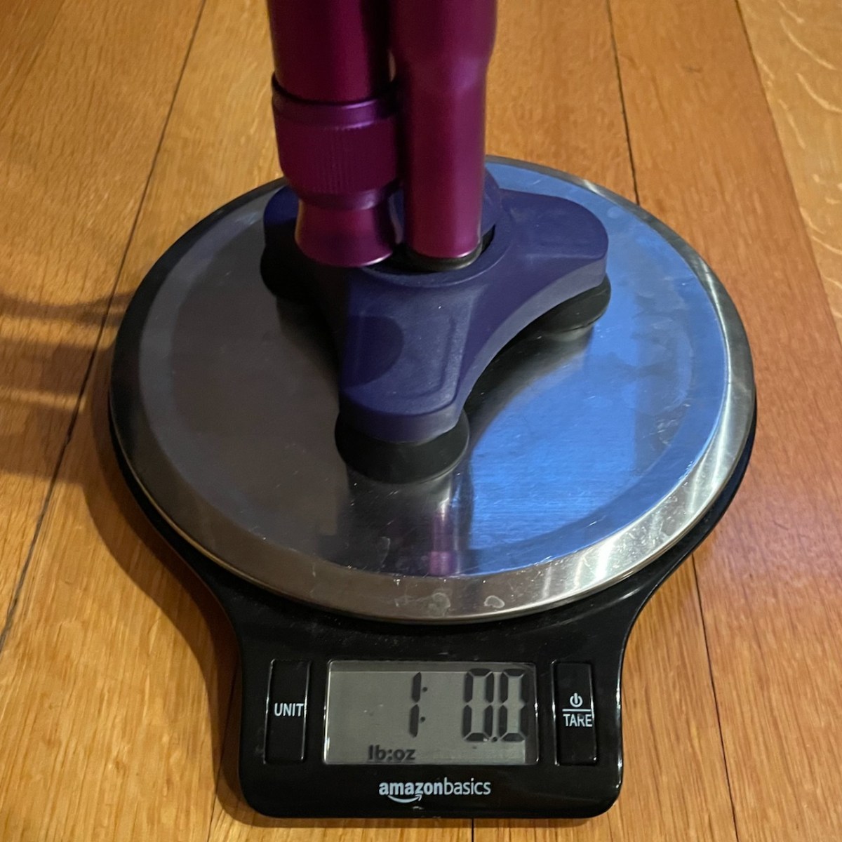 Detail of scale reading exactly 1 lb 0 oz with HurryCane on it