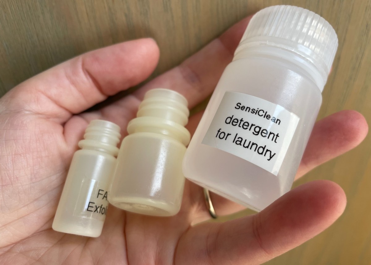 4 mL bottle as small as a pinkie, 8 mL is thumb sized around, and 1 oz Nalgene bottle with detergent, all held in one open hand