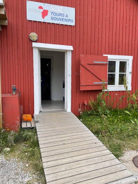 Wooden ramp to building door is not too steep