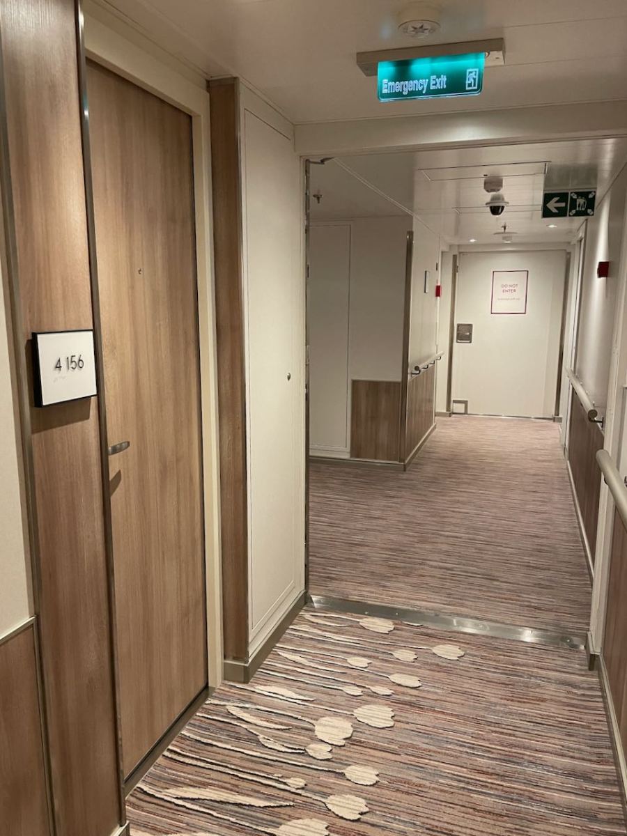 HAL Deck 4 closed isolation area door at end of hall with staterooms