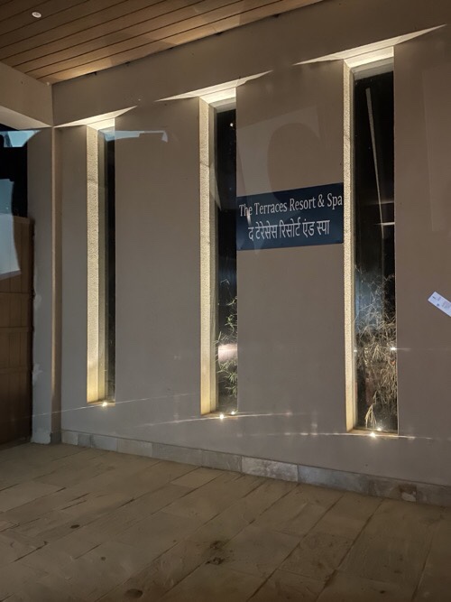 Sign at entrance gate to The Terraces resort